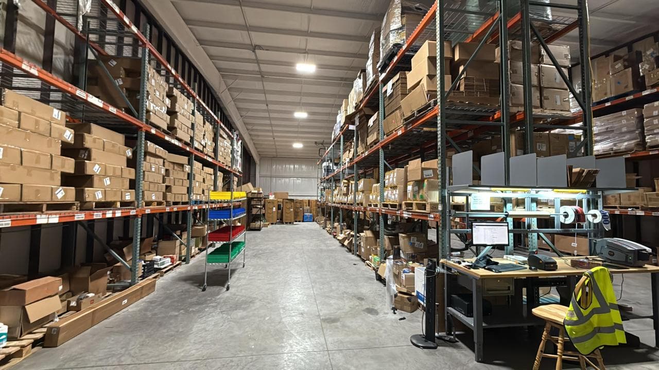 Racked inventory aisles inside the RitePrep warehouse